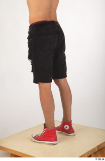 Colin black shorts clothing leg lower body red shoes 0004.jpg